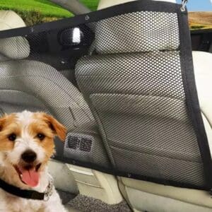 Black mesh dog barrier in a car.