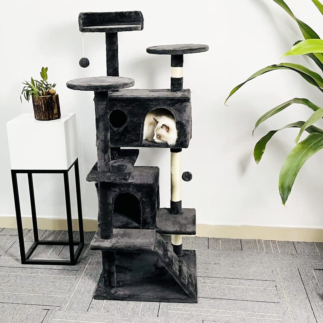 Gray cat tree with a cat inside.