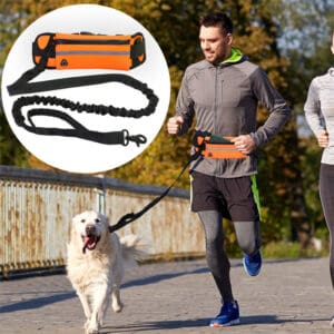 Man running with dog on a hands-free leash.