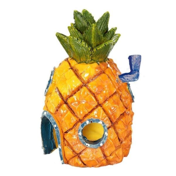 Pineapple-shaped aquarium hideout for fish.