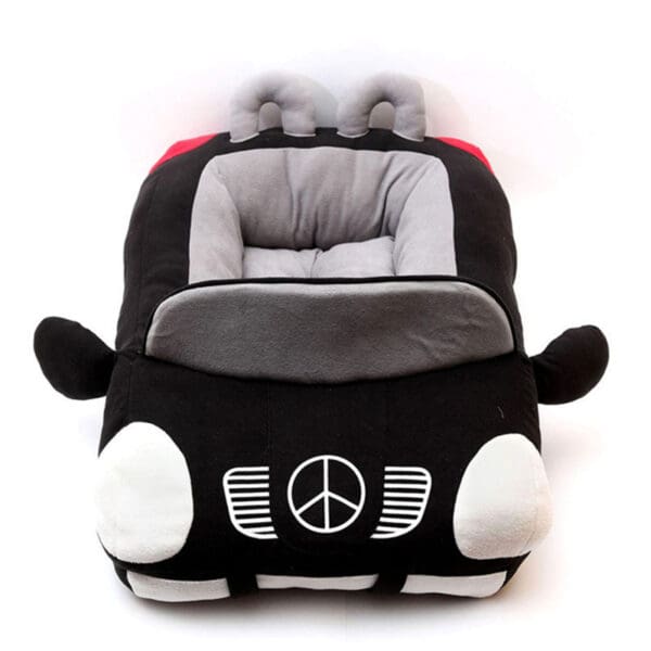 Black car-shaped pet bed with peace sign.