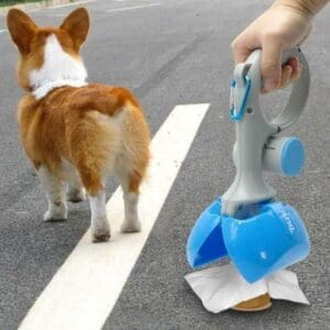 Dog poop scooper with a dog in the background.