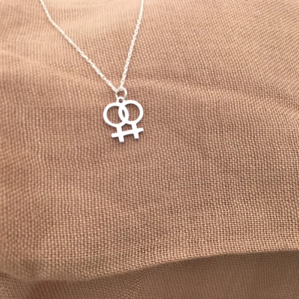 Silver necklace with lesbian symbol pendant.