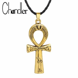 Gold ankh pendant on black cord.