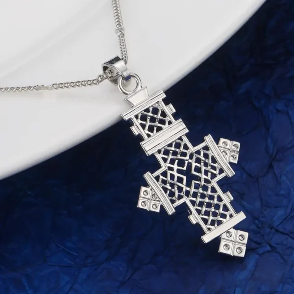 Silver ornate Ethiopian cross pendant necklace.