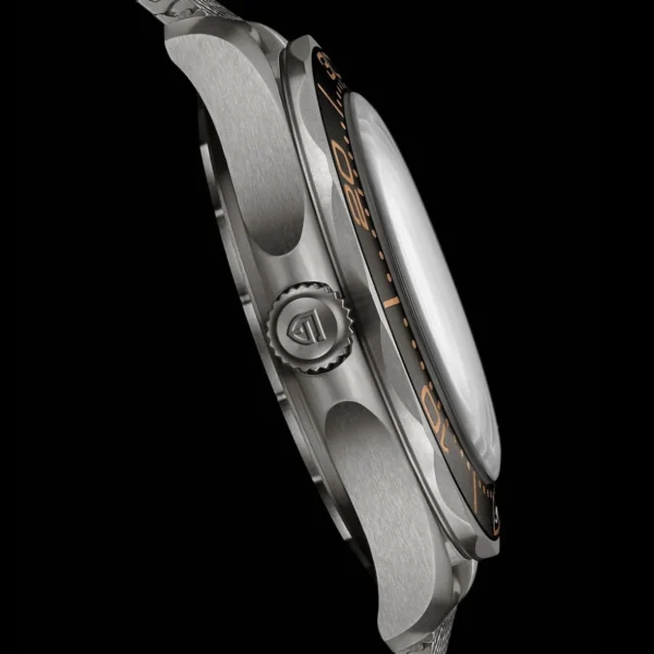 Side view of a silver and black watch.