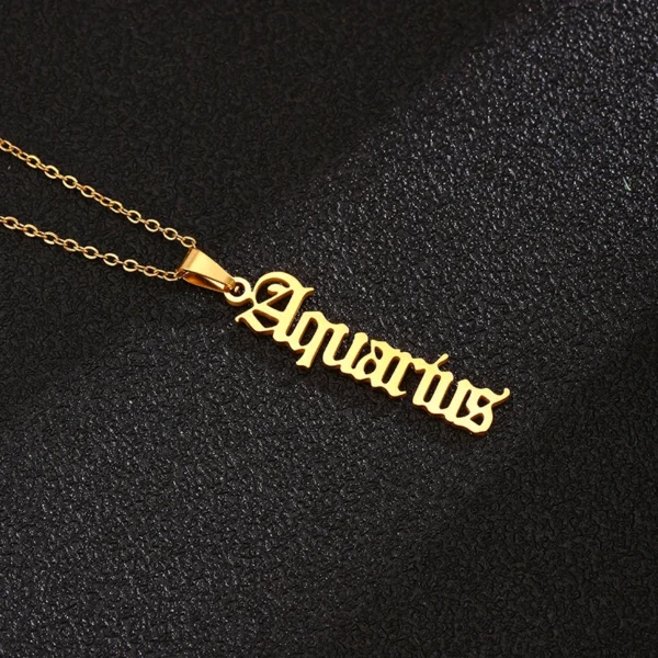 Gold Aquarius zodiac sign necklace.