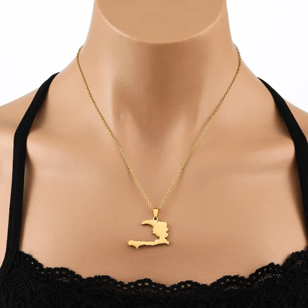 Gold chain necklace with Haiti pendant.