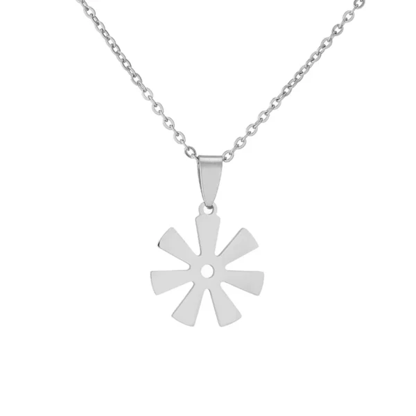 Silver necklace with a starburst pendant.