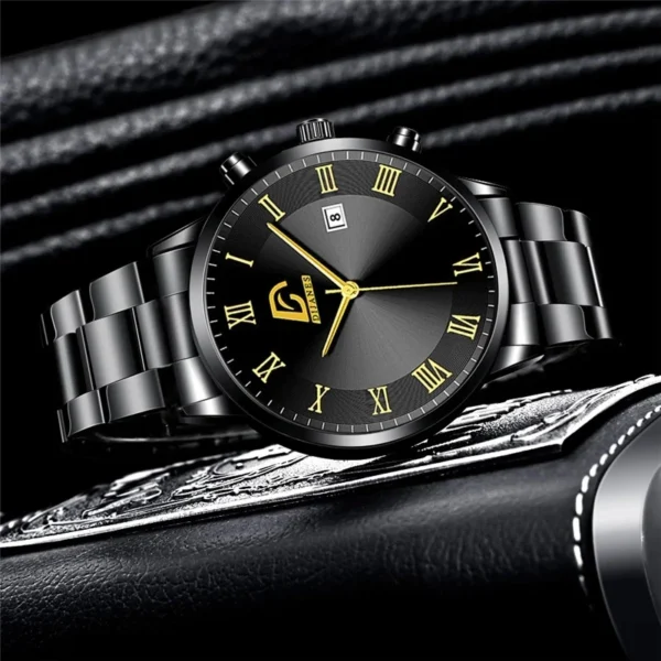 Black and gold men's wristwatch.