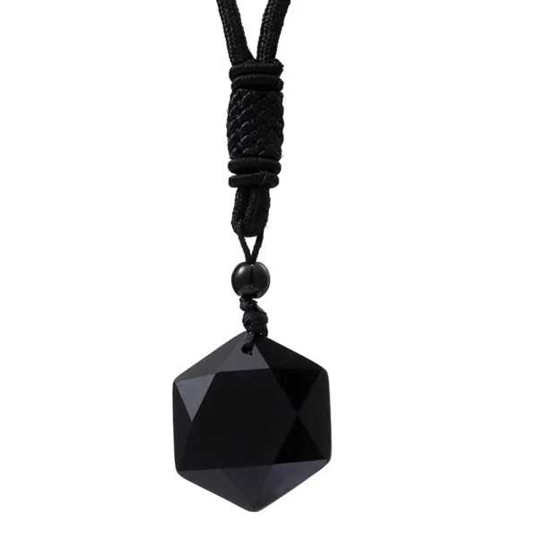 Black crystal pendant necklace on cord.