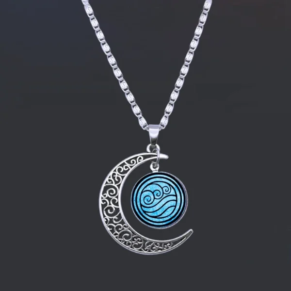 Silver necklace with crescent moon and water symbol pendant.