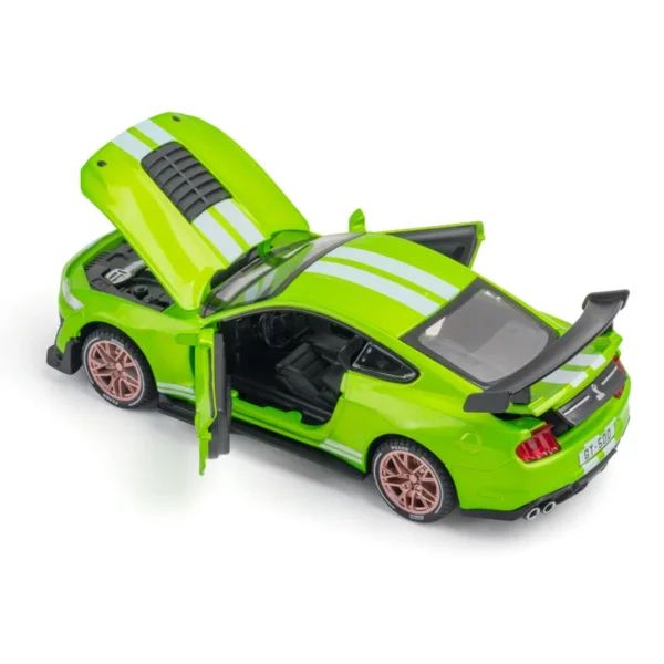 Green toy car with open hood and doors.