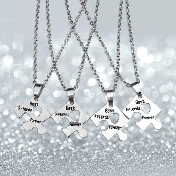 Four silver best friends forever puzzle necklaces.