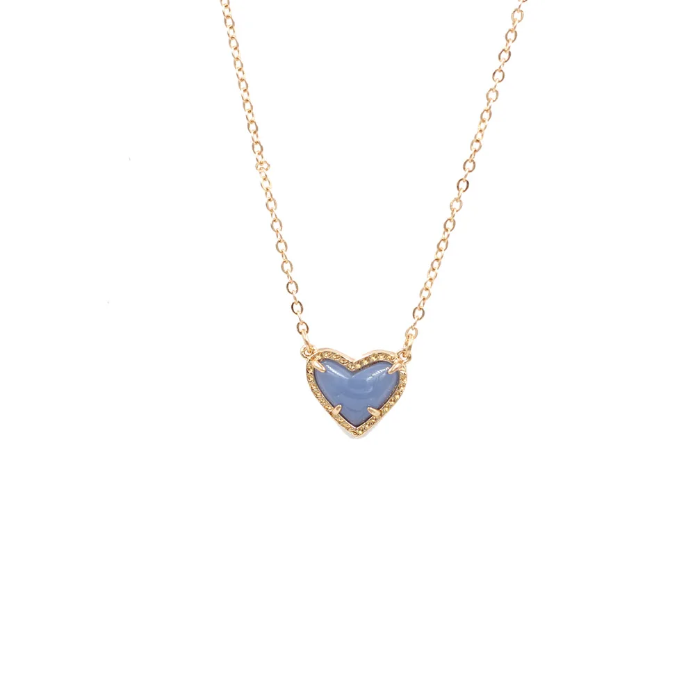 Gold chain with blue heart pendant.