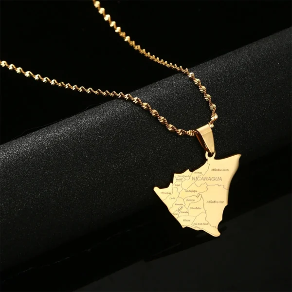 Gold necklace with Nicaragua pendant.