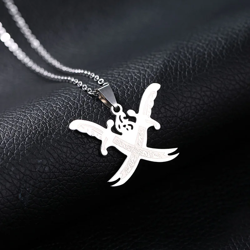 Silver necklace with crossed swords pendant.