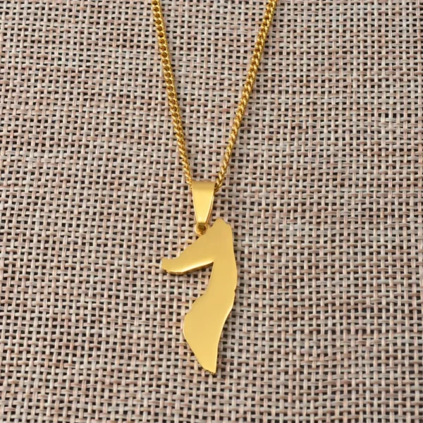 Gold necklace with a seahorse pendant.