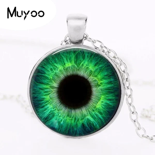 Silver necklace with green eye pendant.