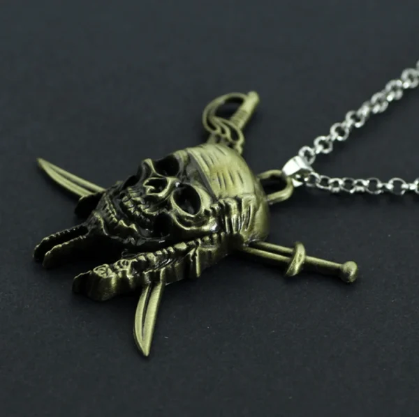 Gold pirate skull and crossbones necklace.