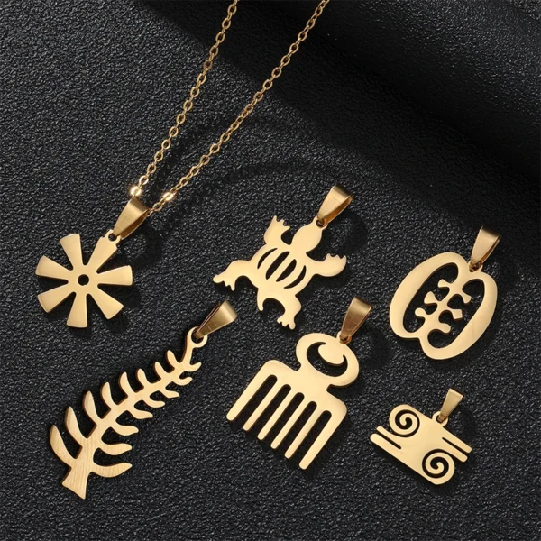 Gold Adinkra symbol pendants on a chain.