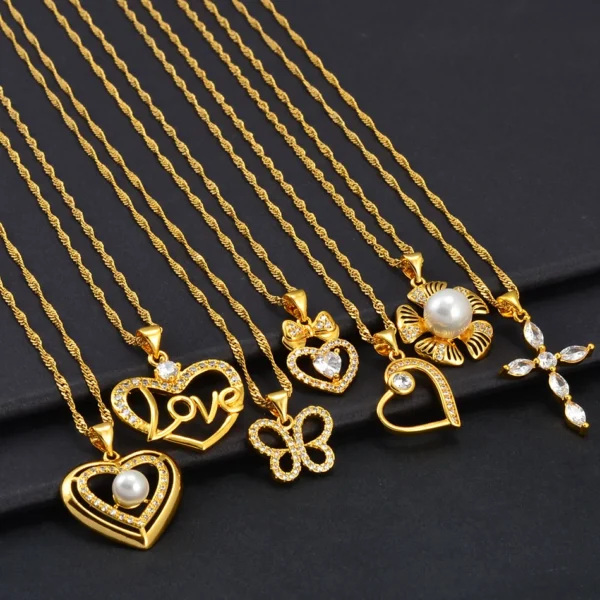 Gold necklaces with various pendants.