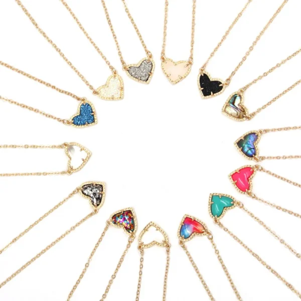 Assortment of gold heart necklaces.