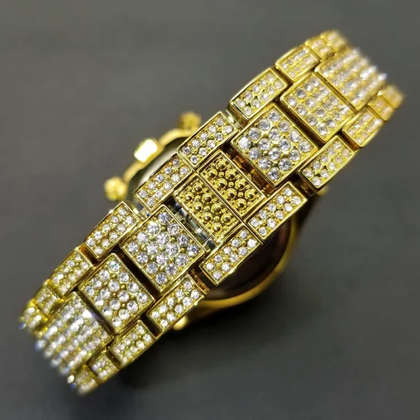 Gold and diamond wristwatch band.