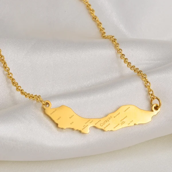 Gold necklace with Curaao island map pendant.