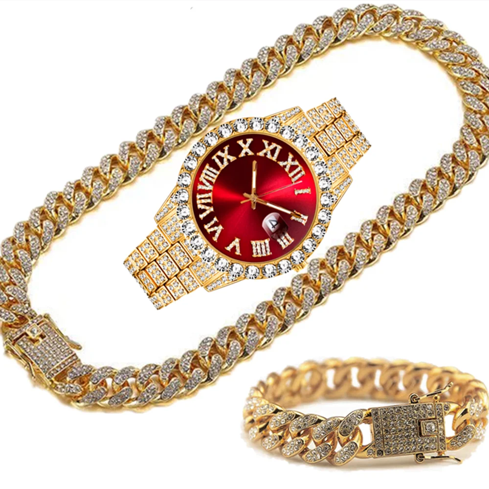 Gold watch with red face and chains.