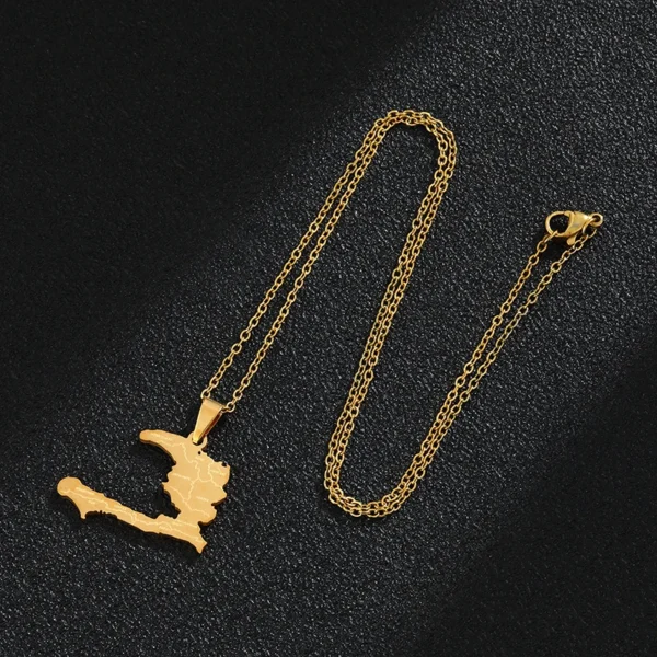 Gold chain necklace with Haiti pendant.