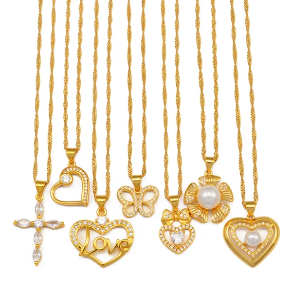 Gold necklaces with heart, flower, and cross pendants.