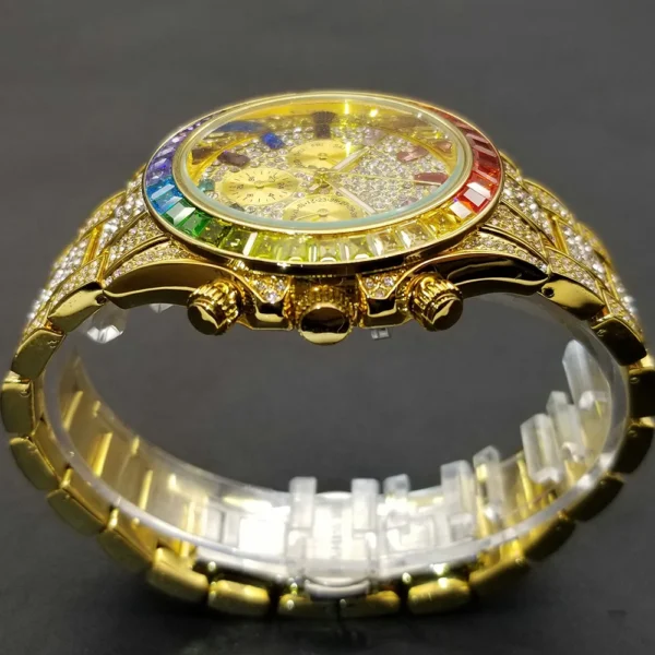 Gold jeweled watch with rainbow bezel.