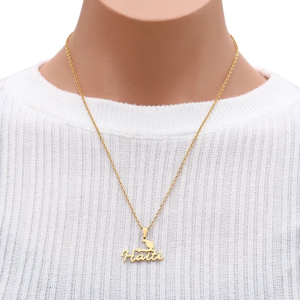 Gold Haiti necklace with map pendant.