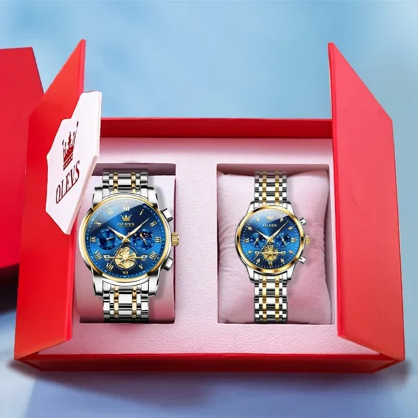 Two gold and silver analog watches in a box.