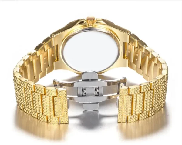 Gold watch with a diamond-like band.