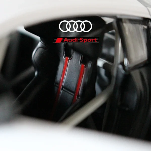 Audi Sport car interior with red stitching.