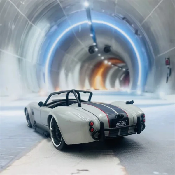 White convertible sports car in tunnel.