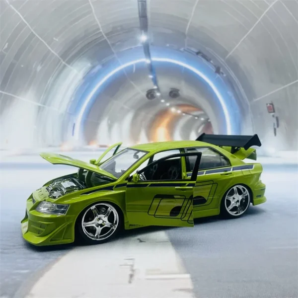 Green Mitsubishi Lancer Evolution in tunnel.