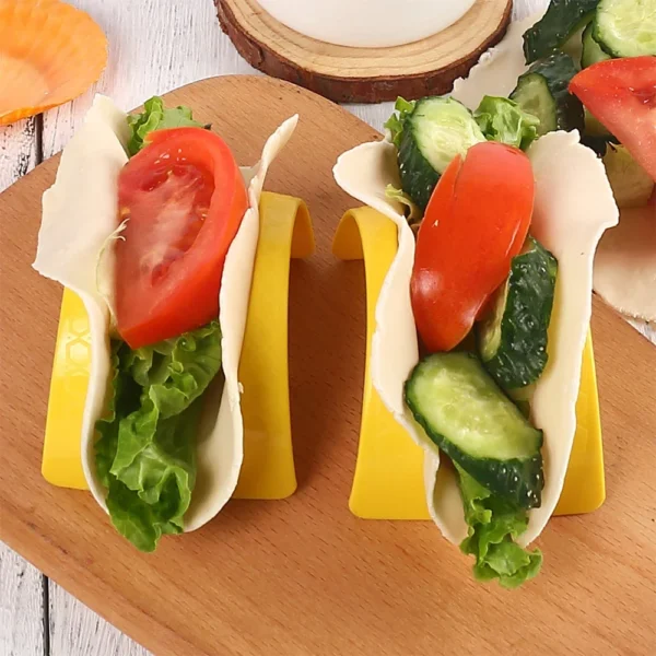 Two yellow taco holders with fillings.