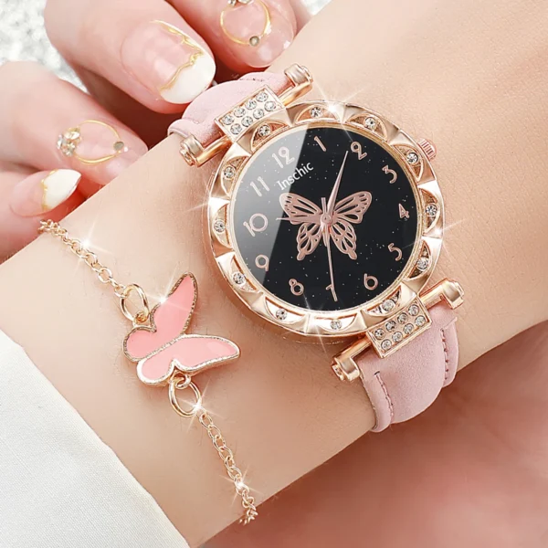 Pink butterfly watch with crystal accents.