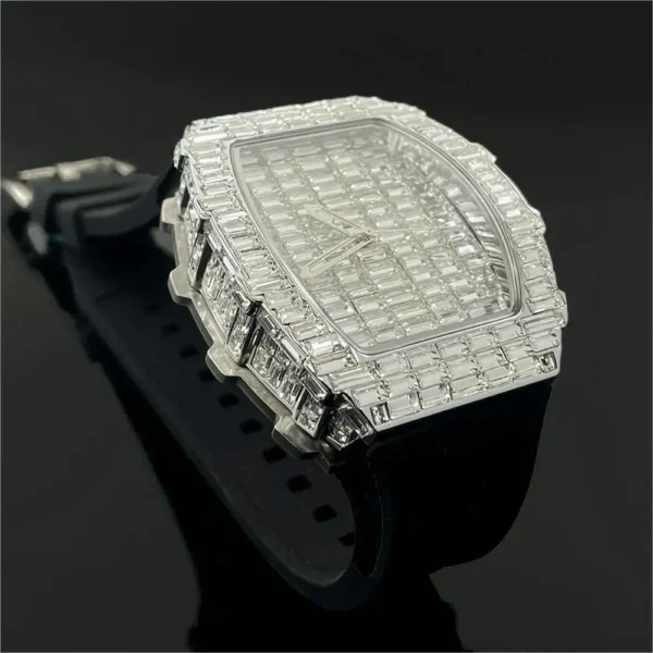 Diamond-encrusted wristwatch with black strap.