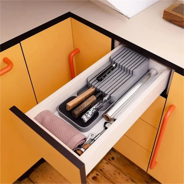 Kitchen drawer with knife organizer and wrap.