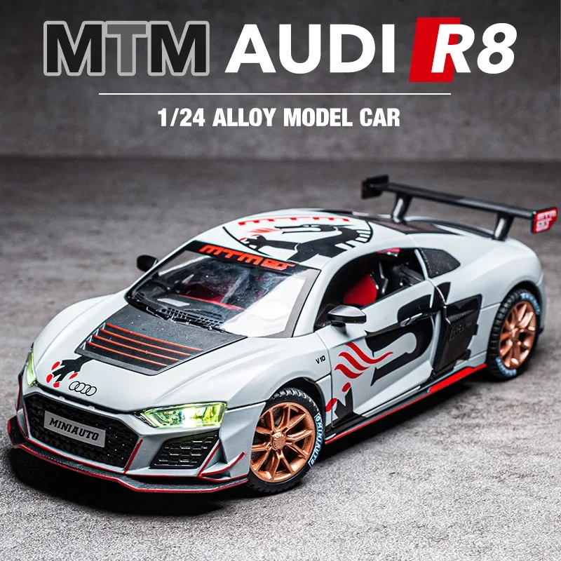 White Audi R8 model car, 1/24 scale.