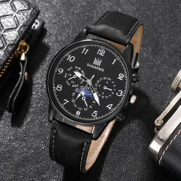 Black leather wristwatch with moon phase.