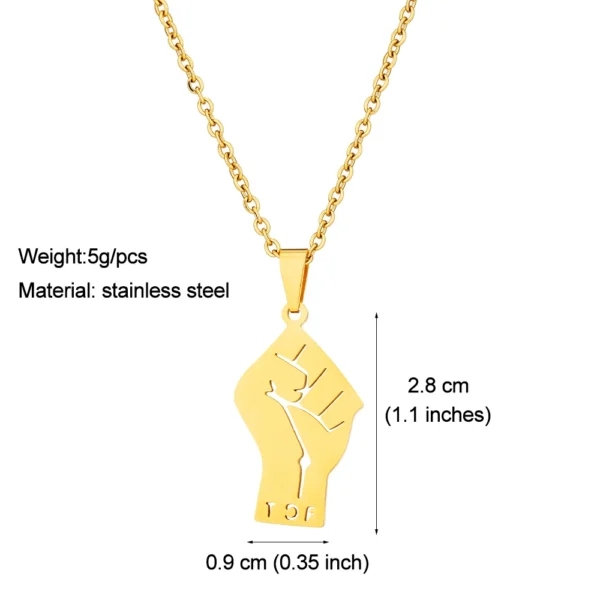 Gold fist pendant necklace with chain.