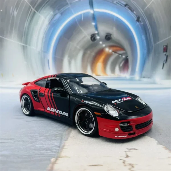 Black and red toy car in tunnel.