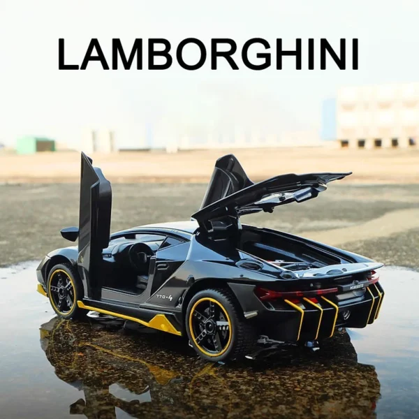 Black Lamborghini toy car with doors open.