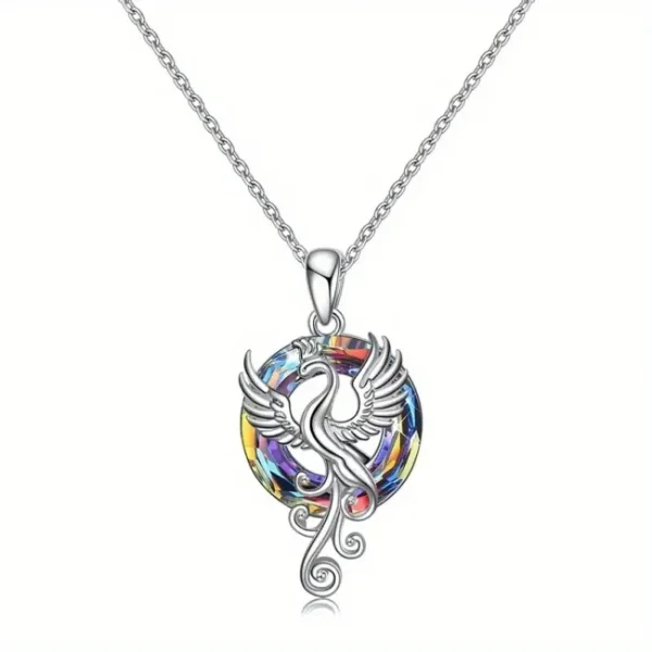 Silver necklace with a phoenix pendant.