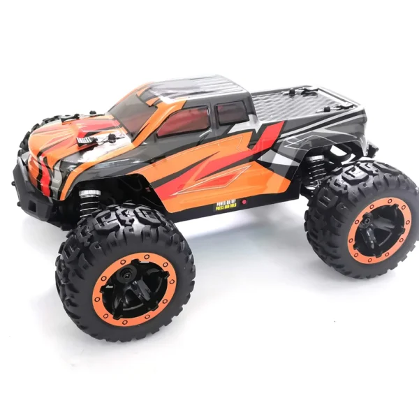 Orange and black remote control truck.